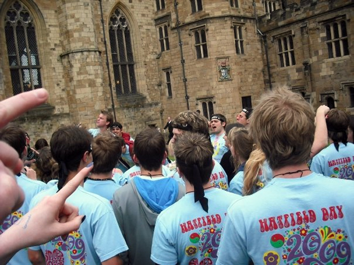 Hatfield students singing their college songs in the Castle Courtyard - an example of the friendly rivalry that exists between colleges. 